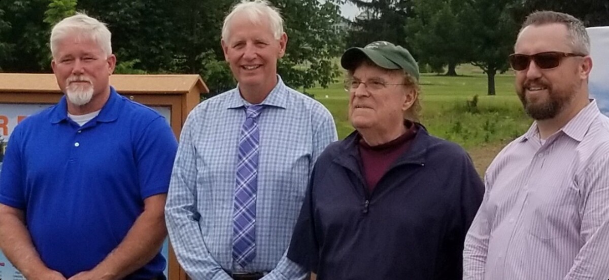 Mr. Easterly, left, with former Park Commissioners Jeff Blazey, Fred Bay, and current Commissioner Ben Yoder
